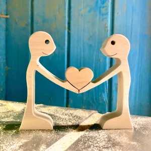 united hearts hand carved wood sculpture